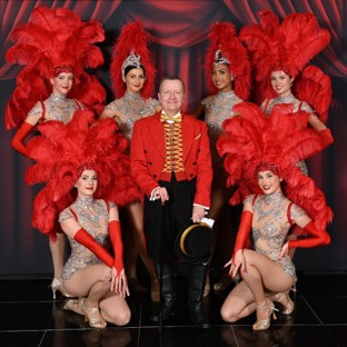 Roger Oldham, Founder of LMF, with Parisian-themed performers at the Market People Awards 2026.